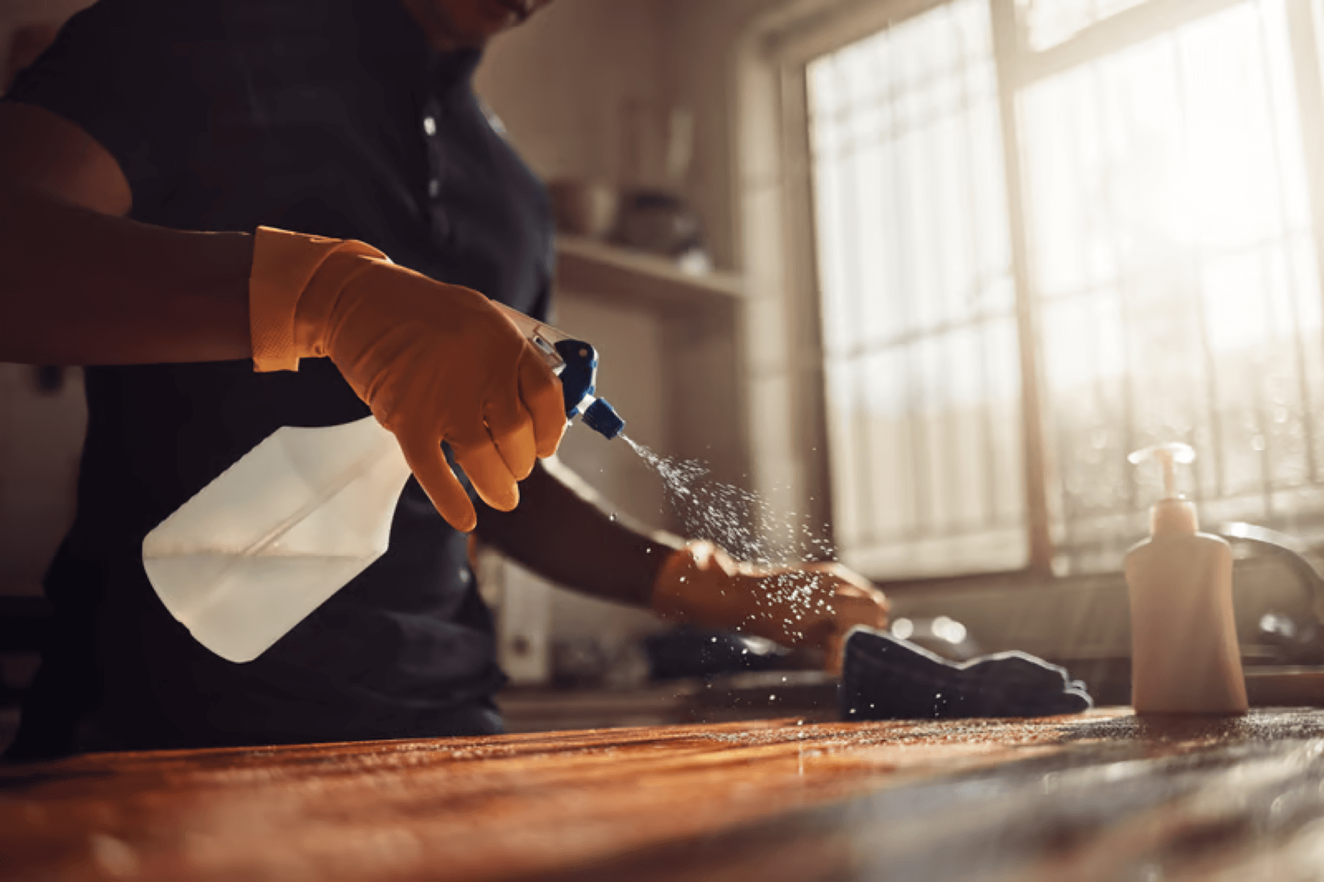 Close-up of a surface being wiped clean during a detailed office cleaning