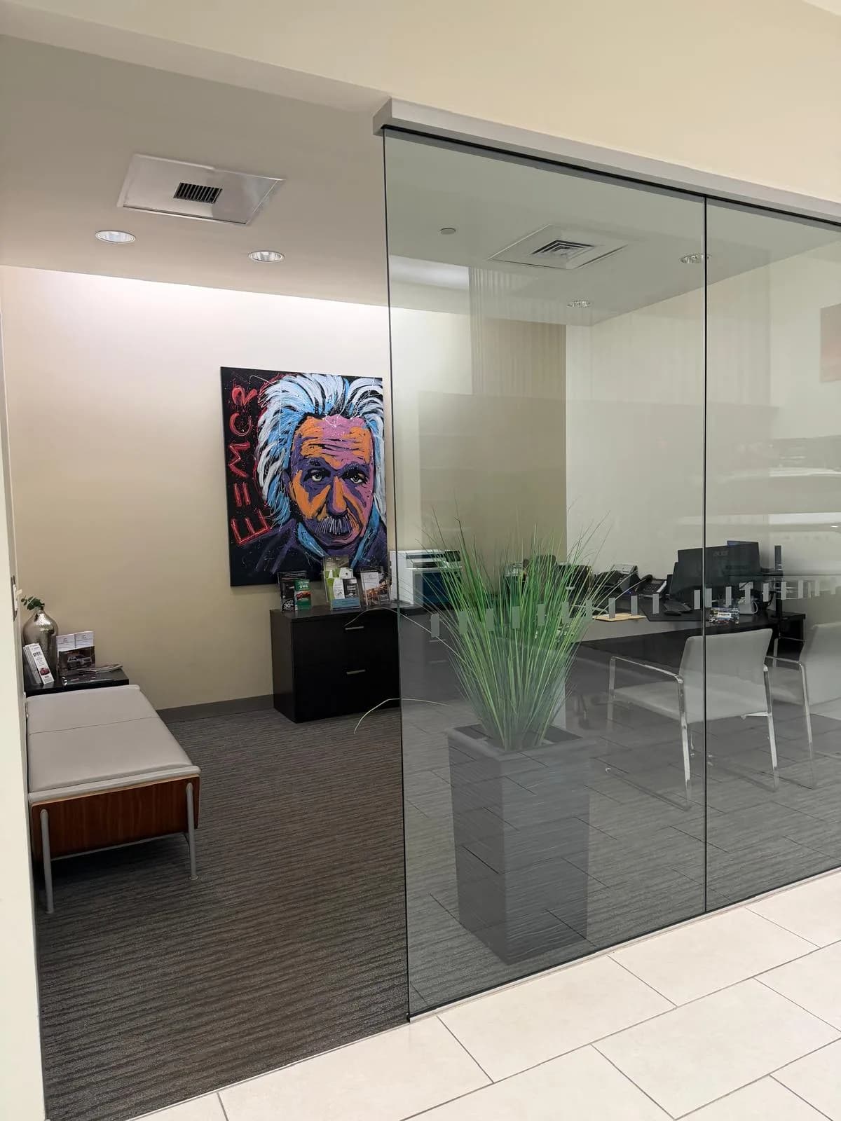 Clean private office with glass walls
